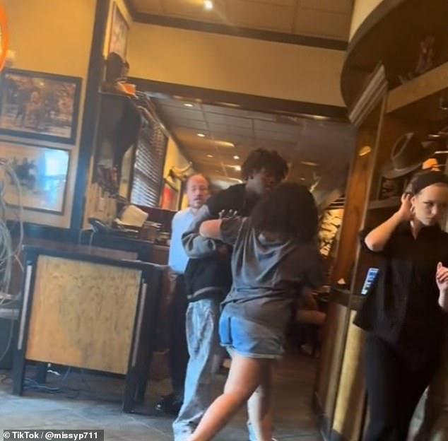 Another diner reordered the brazen altercation, which has amassed more than 7million views on TikTok , as she and her family waited to be sat on Friday