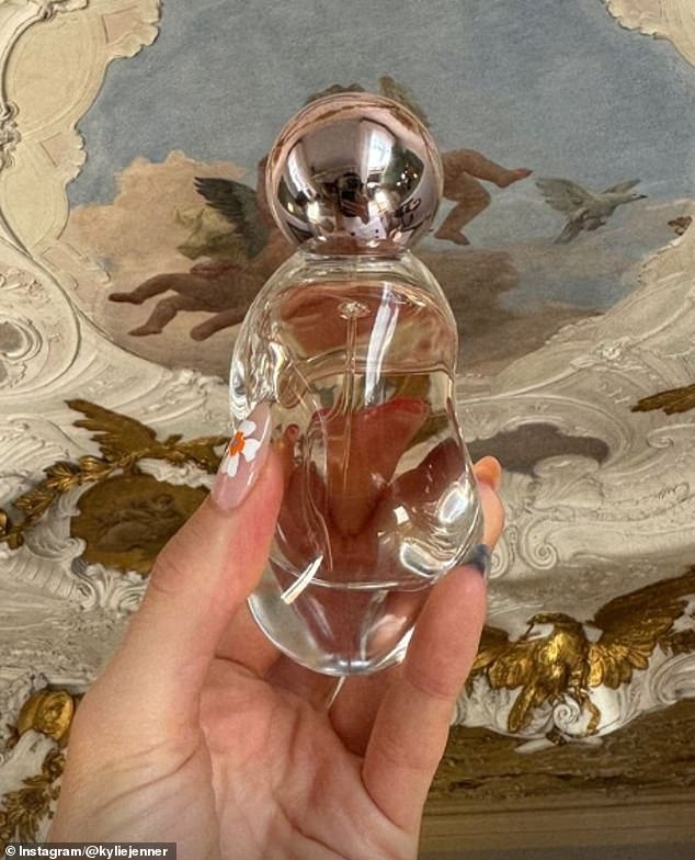 Kylie shared a closeup look at her Cosmic perfume bottle with her legion of fans