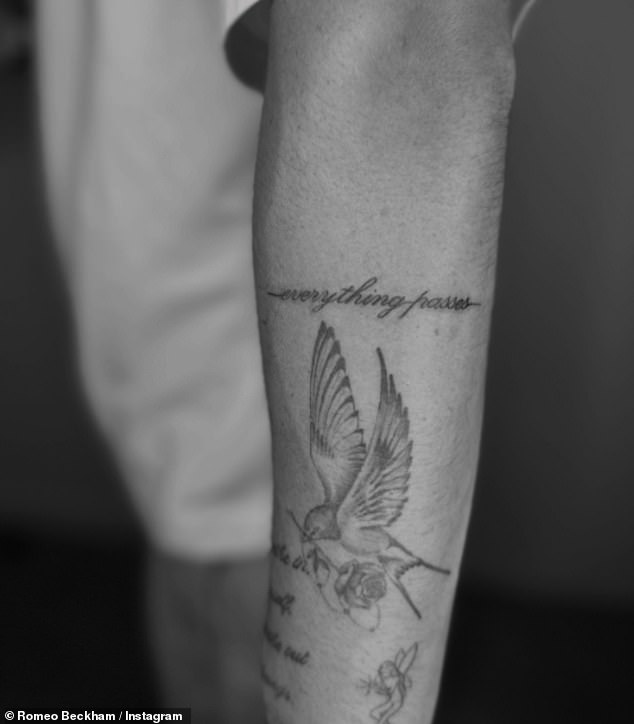 He also had an image of a bird carrying a rose in its mouth with the words: 'Everything passes' on his other arm