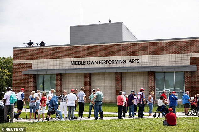 Supporters wait in line outside of Republican vice presidential nominee, U.S. Senator J.D. Vance (R-OH) rally at Middletown High School in his hometown of Middletown, Ohio