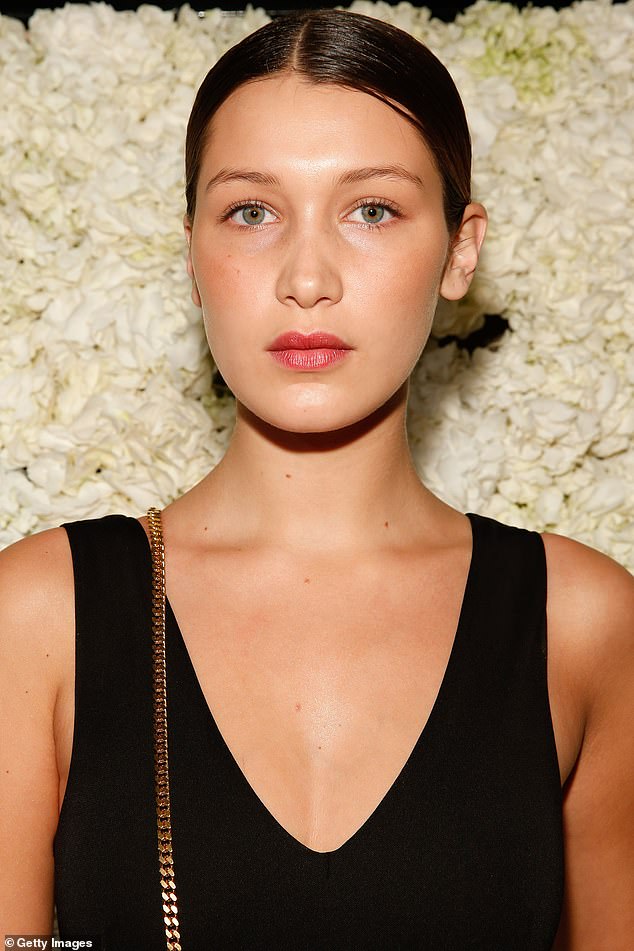 Bella Hadid has been open about having had a nose job when she was a teenager - and in a 2022 Vogue interview admitted that she regrets it. Pictured in 2014, aged 18