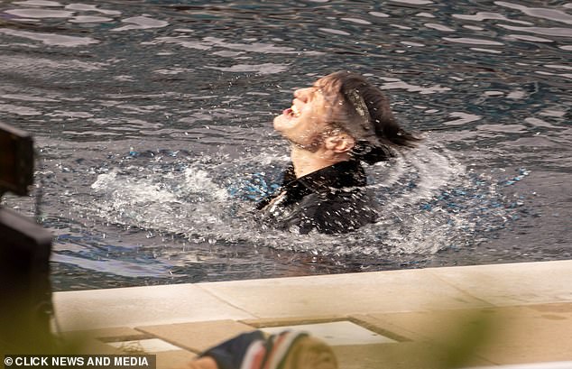 Surrounded by the film crew, Matt then got into the water and could be seen flailing around and gasping for breath