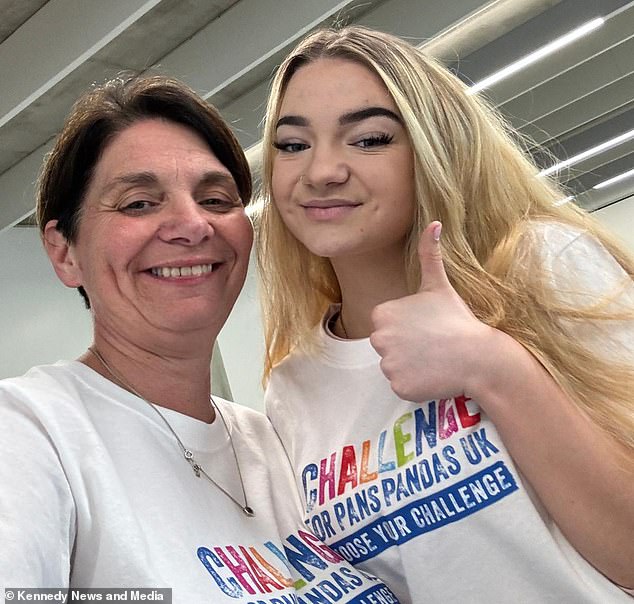 Helen Huitson, 49, and pictured with her daughter Jessica Huitson, 15 who began experiencing 'strange' bodily movements in March 2021 and appeared 'unable to sit still'