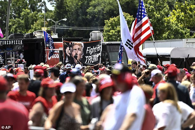 Supporters lined up for hours in the soaring heat to secure a place inside the arena