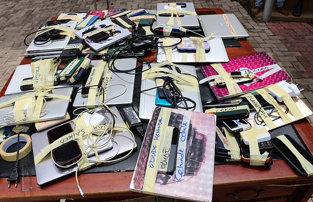 Equipment seized from members of the Yahoo Boys gang