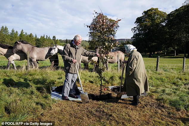 The Queen and Charles start the tree planting for the Queen's Green Canopy project at Balmoral in October 2021