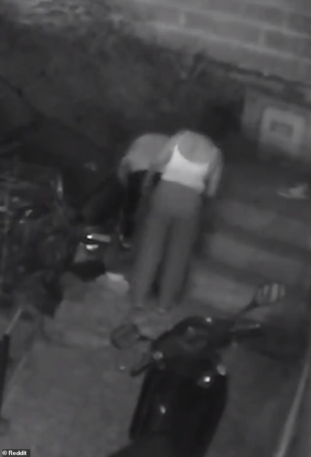 Bystanders check on the man moments after he was knocked out of a home by a strange flying object. The Reddit user who shared the video clip claimed the victim received 24 stitches