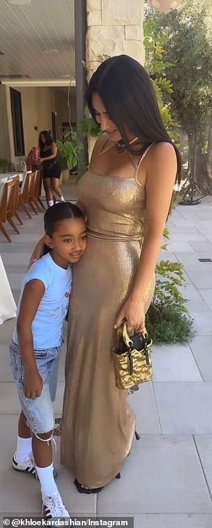 Kim got roasted by Khloe for her outfit - which was a gold gown that looked like something you should wear for a red carpet event not a birthday party for a toddler