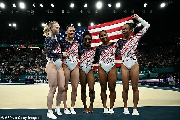 Simone Biles and Sunisa Lee led Team USA to its first Olympic gold in artistic gymnastics since 2016 as the Americans easily beat their rivals. (pictured: Team USA women's artistic gymnastics team)