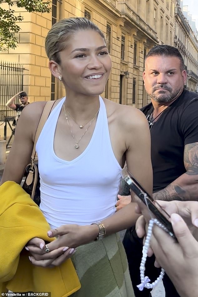 The Spiderman star beamed as she met fans and signed autographs outside the luxurious five star hotel