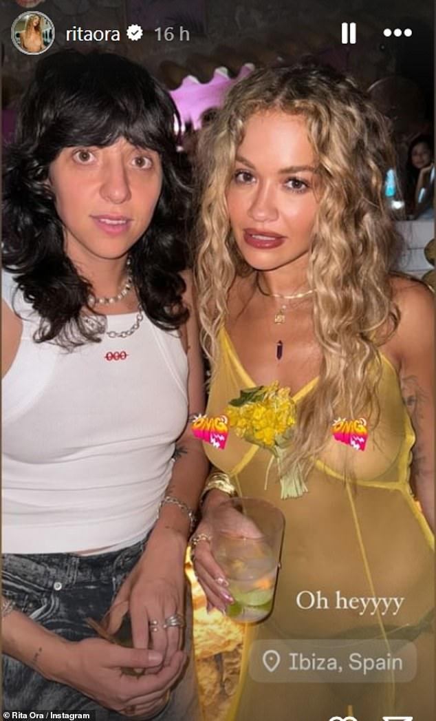 Rita Ora sent temperatures soaring as she donned a see-through dress while enjoying a night out in Ibiza on Wednesday