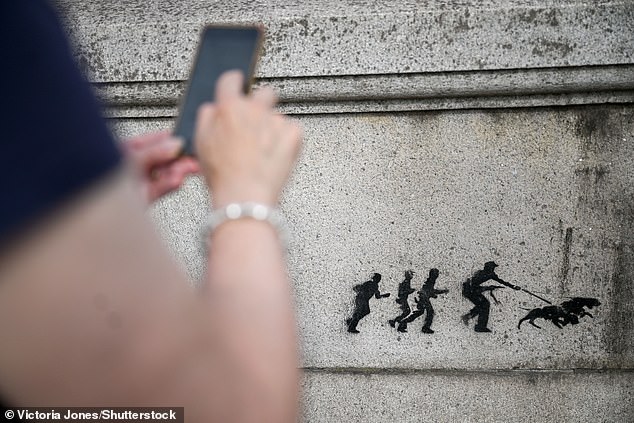 A new Banksy mural appeared by Kew Bridge in London yesterday