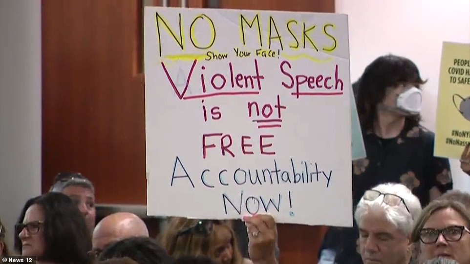 Some attendees had their phones out and were recording the tumultuous scene. Authorities arrested a woman around 6:30 pm and charged her with obstructing governmental administration for allegedly causing a disturbance at the meeting.