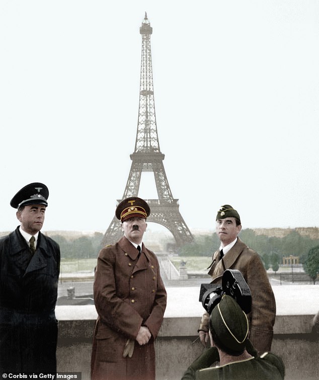 Adolf Hitler with right-hand man and Nazi architect Albert Speer, left, and German sculptor Arno Breker by the Eiffel Tower in Paris in June 1940