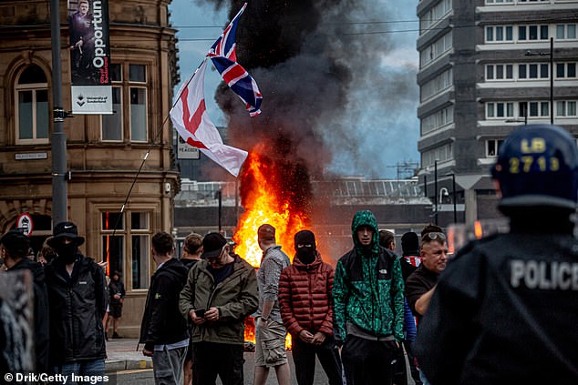 Far-Right protesters hold a demo in Sunderland last weekend, monitored by riot police