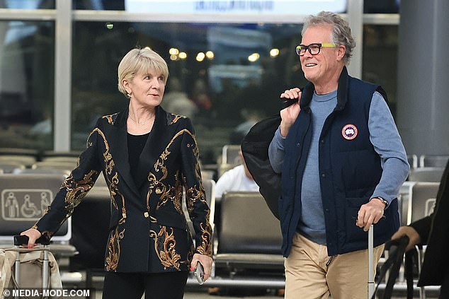 The lovebirds were all smiles as they jetted into Sydney