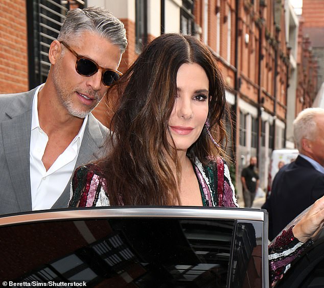 Sandra pictured with photographer Bryan in London in June 2018