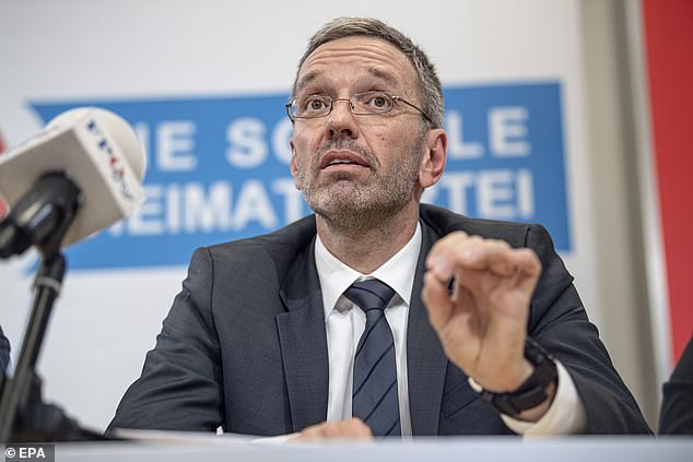 Austrian Interior Minister Herbert Kickl of the right-wing Austrian Freedom Party (FPOe), delivers a press statement next to Norbert Hofer in 2019