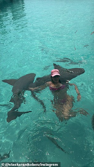 She also shared footage of herself wearing the same bikini but this time with a light pink trucker cap on her head