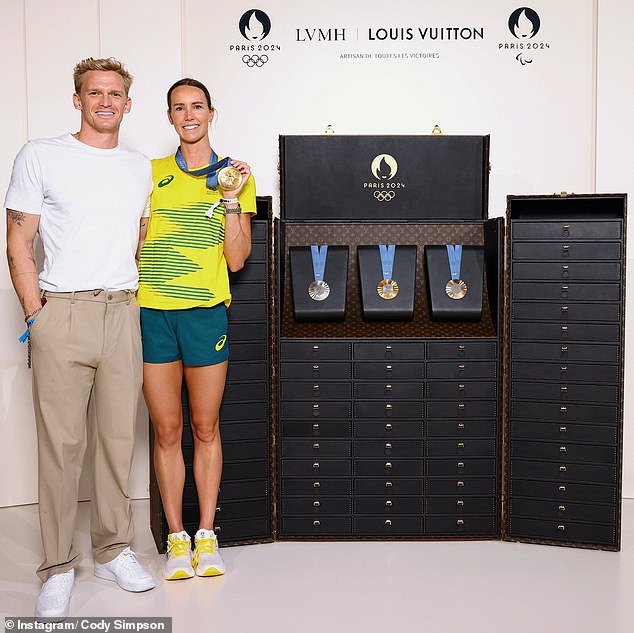 Simpson, 27, who almost qualified for the Games himself, took to Instagram on Tuesday to cheer on Emma's success. Cody shared a picture of himself next to his sweetheart as she held up her gold medal beside a display case with her other medals from the 2024 games