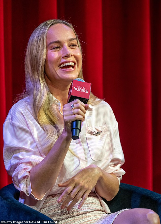 The actress, 34, who plays Elizabeth Zott, looked very chic in her suit as she discussed her Apple TV series Lessons In Chemistry with her co-star Aja