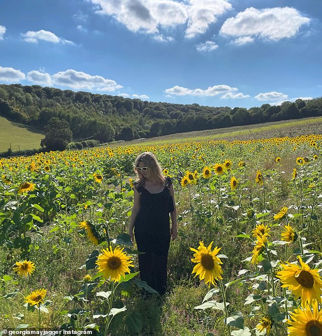 The daughter of music legend Mick Jagger made the most of the gorgeous landscape and posted a photo of herself walking through the field