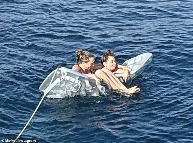 In one sweet snap, the pair looked more loved-up than ever as they struck up a smile for the camera while floating on an inflatable lilo