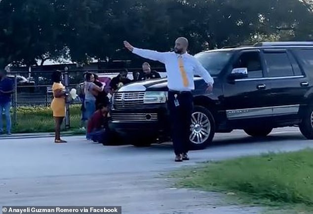 A Florida mother ran over her 12-year-old daughter after she got out of the car near Booker Middle School in Sarasota