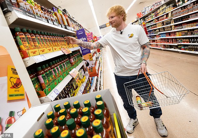 He selected some bottles off the shelves