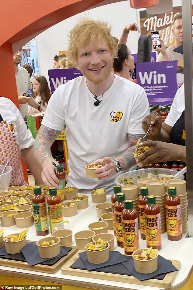 Ed Sheeran was mobbed by hundreds of fans as he made yet another surprise appearance on Tuesday - this time at a Sainsbury's store to promote his Tingly Ted's hot sauce