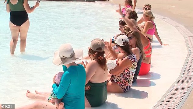 A group of Ohio mothers have come together to show their support for a woman who was asked to breastfeed in private rather than near a swimming pool