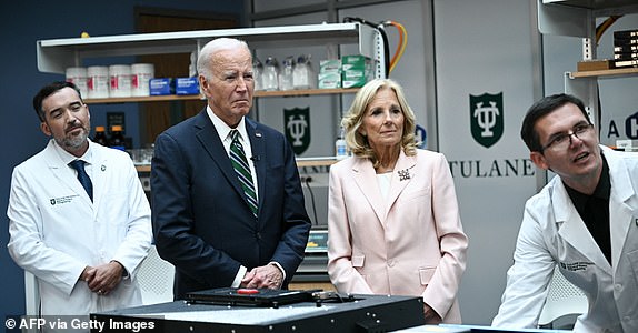 US President Joe Biden and First Lady Jill Biden are participating in a cancer research demonstration during the Biden Cancer Moonshot Event at Tulane University in New Orleans, Louisiana, on August 13, 2024. (Photo by Brendan SMIALOWSKI / AFP) (Photo by BRENDAN SMIALOWSKI/AFP via Getty Images)