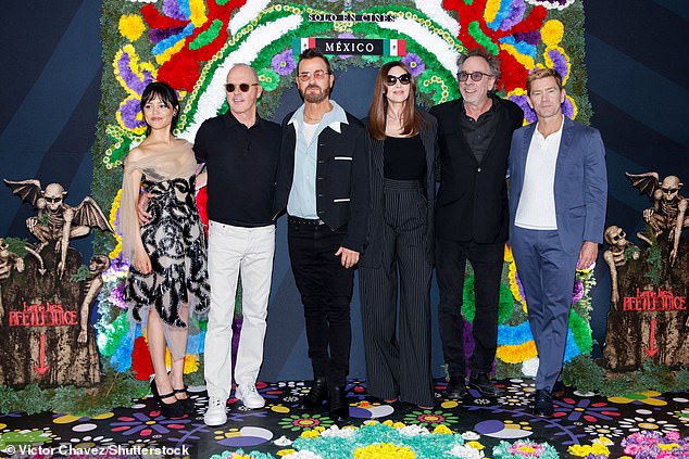 She appeared in top spirits as she posed on the carpet with , Michael, Justin, Monica, Tim Burton and Tommy Harper