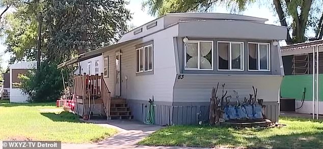 The little boy was confined to a barricaded pen where he slept on a wooden plank measuring three feet by 11 inches at the trailer home in Madison Heights, Michigan