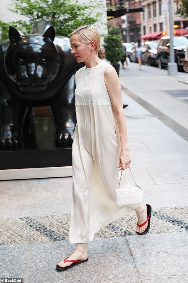 Michelle Williams pictured wearing £630 flip-flops from The Row in New York in June