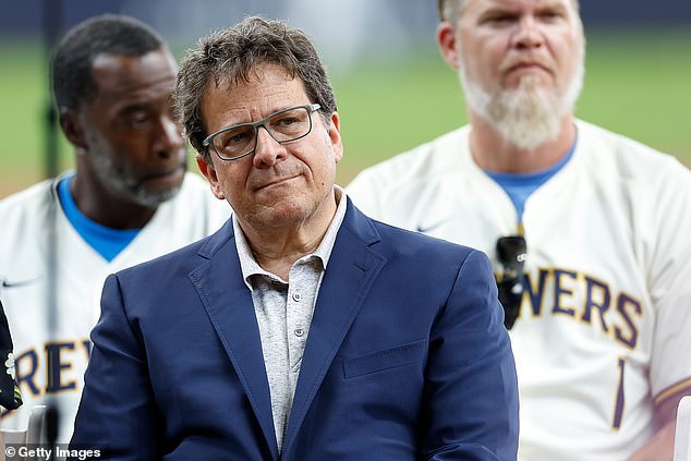 Milwaukee Brewers owner Mark Attanasio is being sued for 'using a public beach as their own personal sandbox' by his well-heeled neighbors in Malibu, California