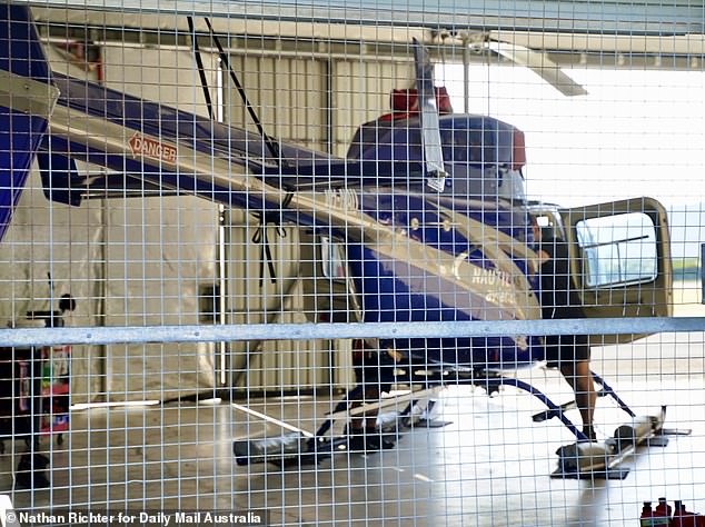 Nautilus helicopter in the hangar where Blake Wilson stole a R44 Robinson craft in the early hours of Monday morning and flew it for four minutes before crashing into the Double Tree