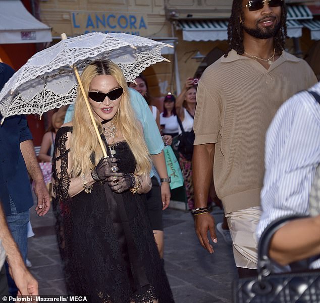 She kept sunglasses on as they made their way to the restaurant for lunch