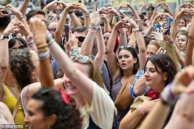 Officials say Taygating - fans amassing outside the stadium without tickets to listen to the concert - will not be tolerated (Pictured: Fans outside the cancelled Vienna concerts' venue)