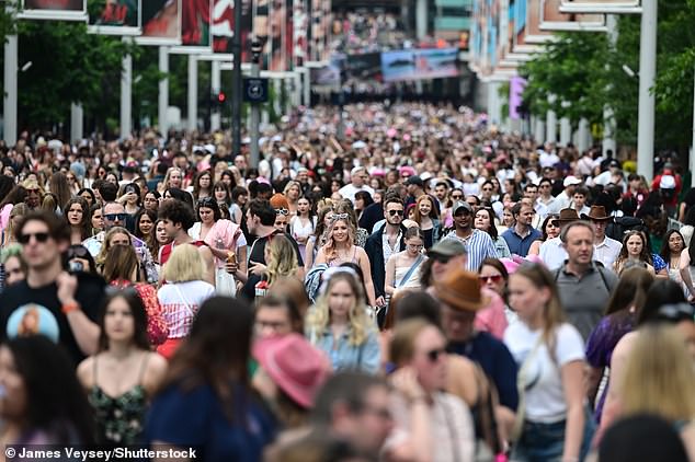 The Shake It Off singer will perform her Eras tour over five nights from tomorrow at London's biggest concert venue (Pictured: Fans arriving at Wembley for the singer's concerts in June)