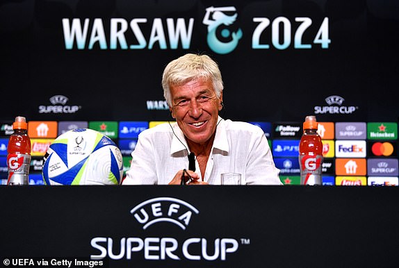 WARSAW, POLAND - AUGUST 13: Gian Piero Gasperini, Head Coach of Atalanta BC, speaks to the media in a press conference at the National Stadium on August 13, 2024 in Warsaw, Poland. (Photo by Valerio Pennicino - UEFA/UEFA via Getty Images)