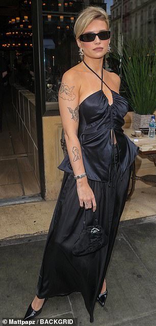 The influencer, 26, who is the younger sister of super model Kate Moss, showcased her incredible physique as she stepped out in a sexy black pleather dress