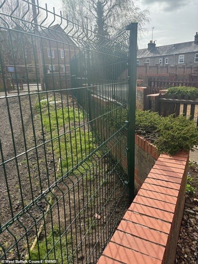 The fencing around the Cotton Lane allotment site in Bury St Edmunds, Suffolk