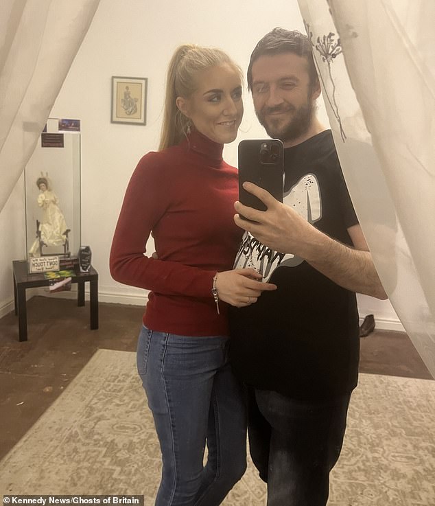 Lee Steer (right) had been conducting a paranormal investigation with his partner Sarah Carter (left)  in the 'bridal doll room' of his museum when he felt a burning sensation