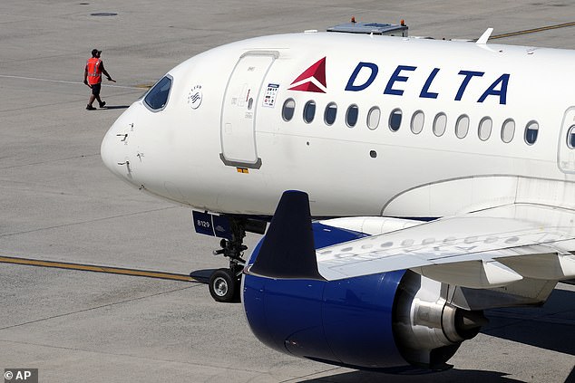 An unidentified man was forcibly removed from a Delta Airlines flight out of Dulles International Airport on August 2