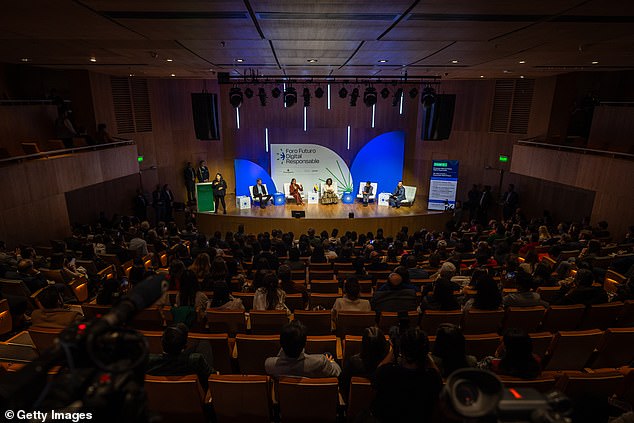 Harry and Meghan on stage at the Responsible Digital Future forum in Bogota yesterday