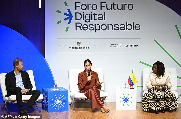 Harry and Meghan on stage at the Responsible Digital Future forum in Bogota yesterday