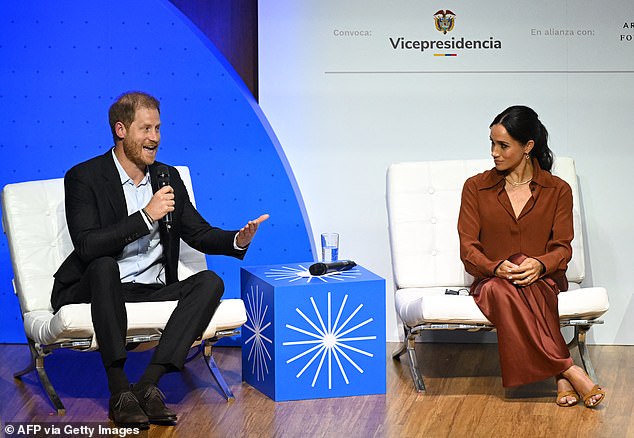 Harry and Meghan on stage at the Responsible Digital Future forum in Bogota yesterday