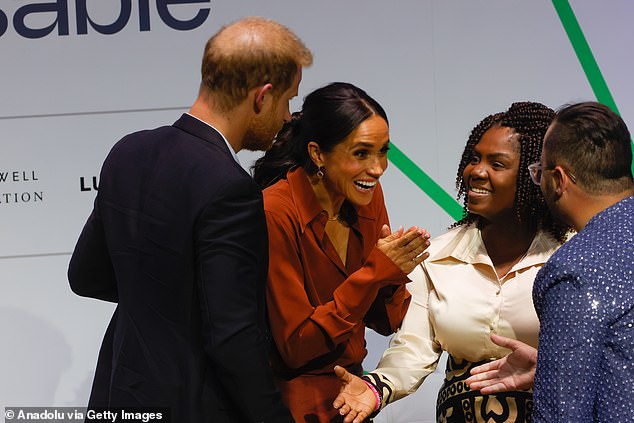 During the quasi-royal tour, the couple beamed with enthusiasm as they shook hands with Vice President of Colombia, Francia Marquez (right)