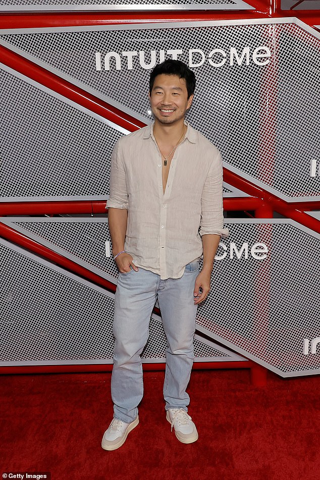 Action man  Simu Liu sported a linen shirt and blue jeans